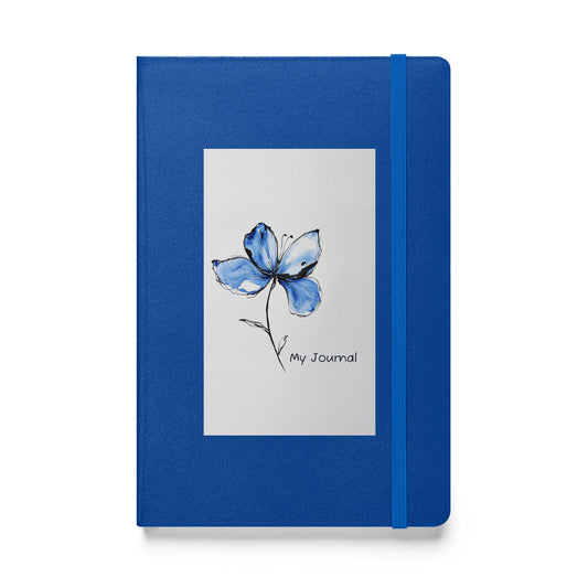 Product mockup of a blue journal with a Blue Butterfly Bean flower on it and the words My Journal