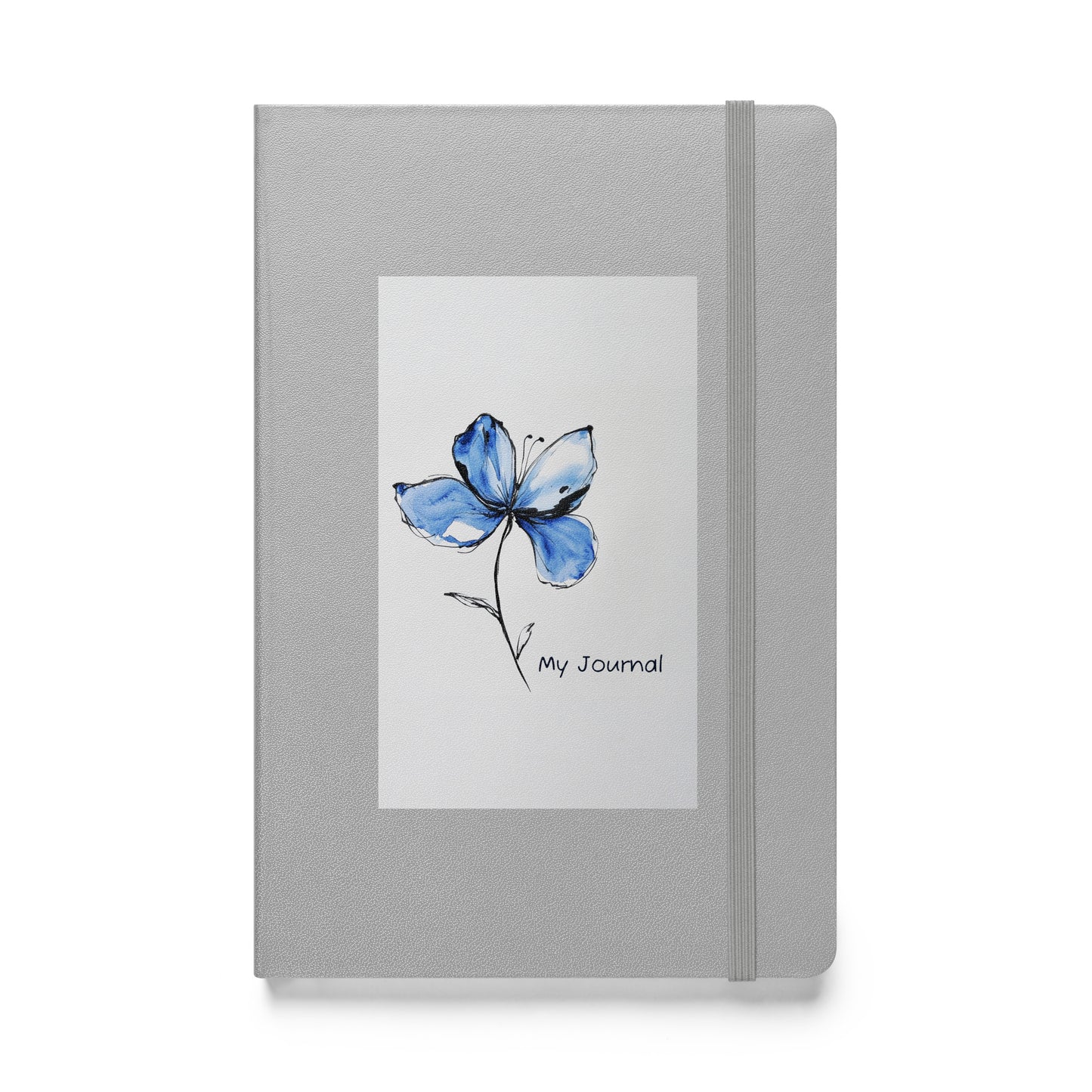 Product mockup of a silver journal with a Blue Butterfly Bean flower on it and the words My Journal